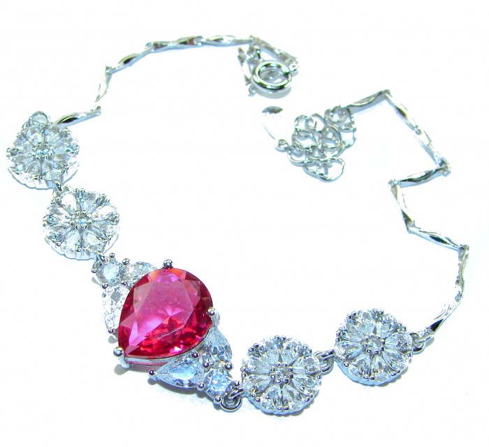 Giovanna - Magnificent Jewel 7.2 carat Ruby .925 Sterling Silver handcrafted incredible Statement Bracelet - Necklace with 7.2 carat ruby and crystal detail on white background.