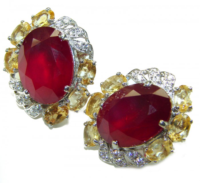 Black Lable Collection - Blooming Roses Authentic 28.9 carat Mozambique Ruby Rhodium over .925 Sterling Silver brilliantly handcrafted earrings - Close-up of Blooming Roses earrings with red stones and yellow accents.