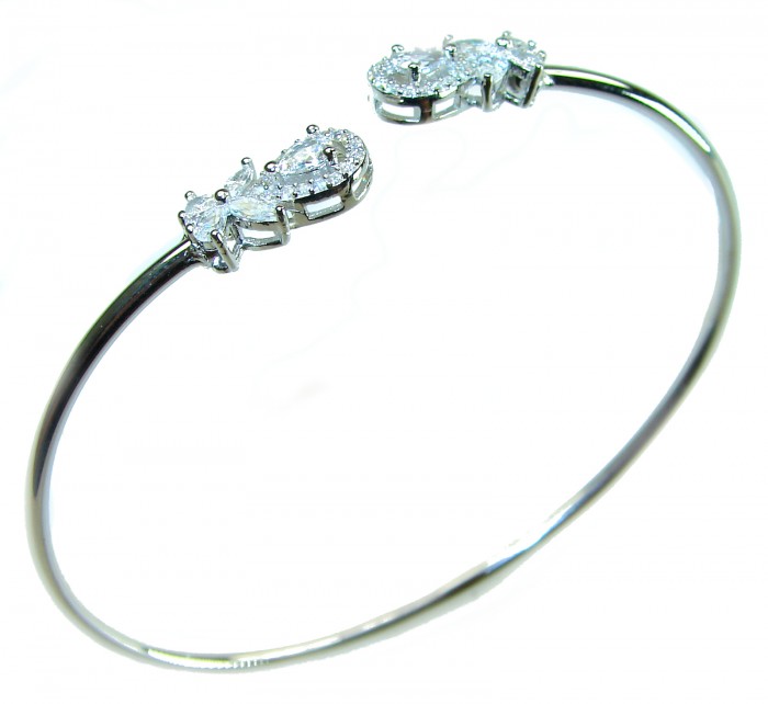 Precious Light Natural 4.2 carat White Topaz .925 Sterling Silver bracelet - Side view of sterling silver bangle with white topaz stones.