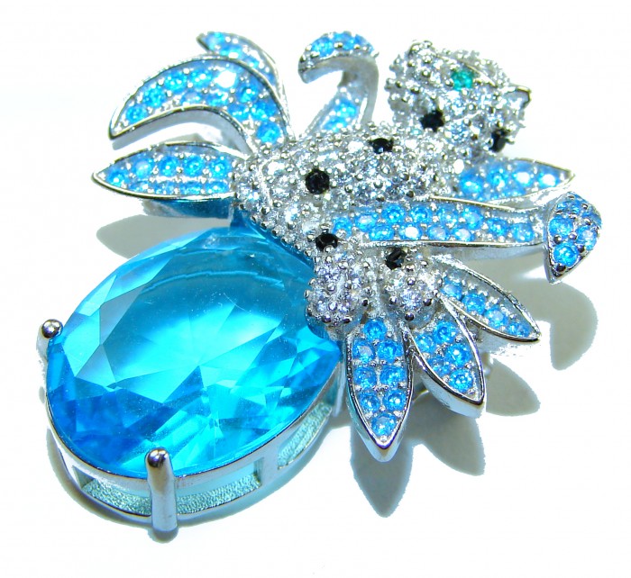 Blue Cheetah authentic 12.5 carat Swiss Blue Topaz .925 Sterling Silver Handcrafted pendant brooch - Blue Cheetah jewelry with Swiss Blue Topaz close-up