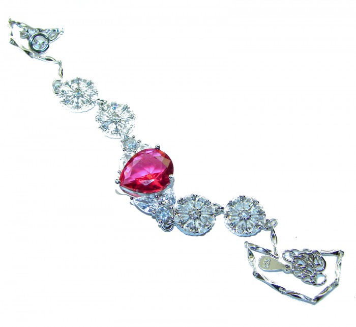 Giovanna - Magnificent Jewel 7.2 carat Ruby .925 Sterling Silver handcrafted incredible Statement Bracelet - Elegant bracelet, top view, featuring a central 7.2 carat ruby and clear stones.