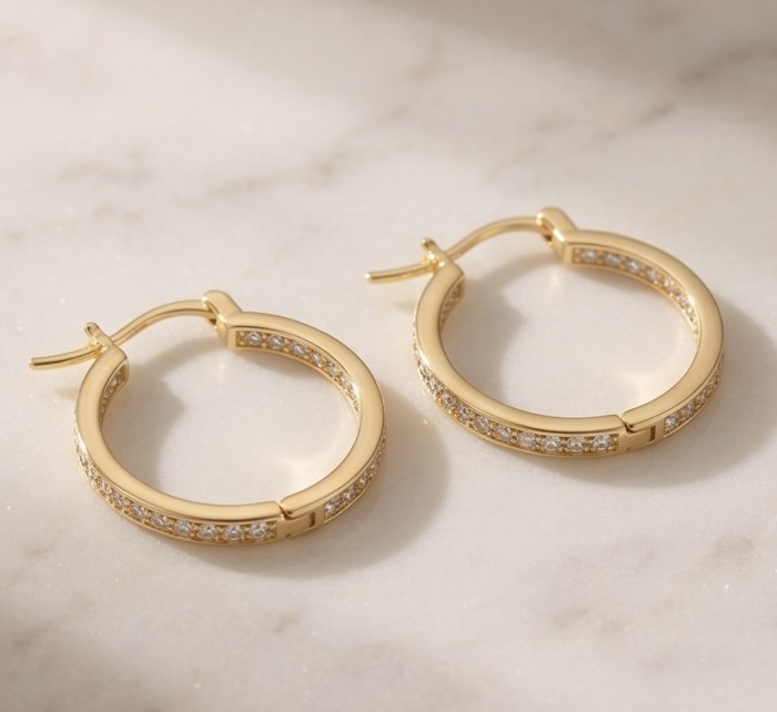 Dubai Style - .925 Sterling Silver dipped in 22K Gold handmade Large Earrings - Gold hoop earrings with crystal detail on marble background.