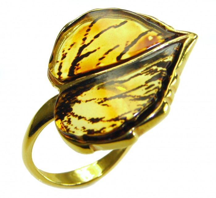 Authentic carved Baltic Amber .925 Sterling Silver dipped in 18K Gold handcrafted ring; s. 8 adjustable - Side view of carved Baltic Amber ring in Sterling Silver setting.