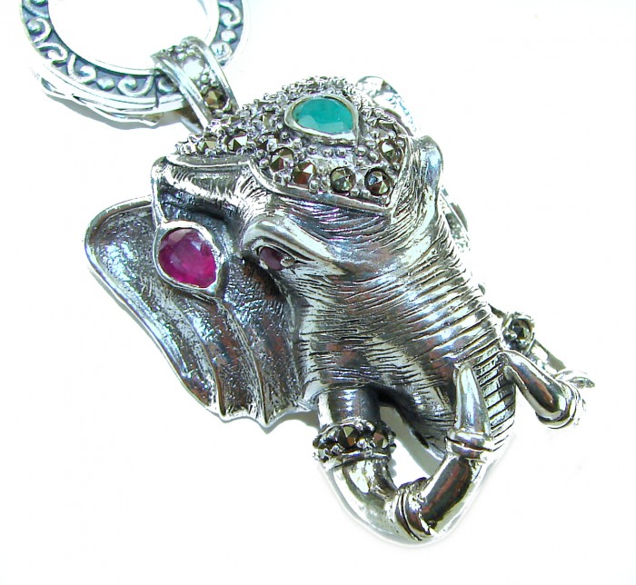 Luck and Prosperity HUGE 55.5 grams ELEPHANT genuine EMERALD .925 Sterling Silver handcrafted Necklace - Elephant pendant with emerald and ruby stones, top view close-up.