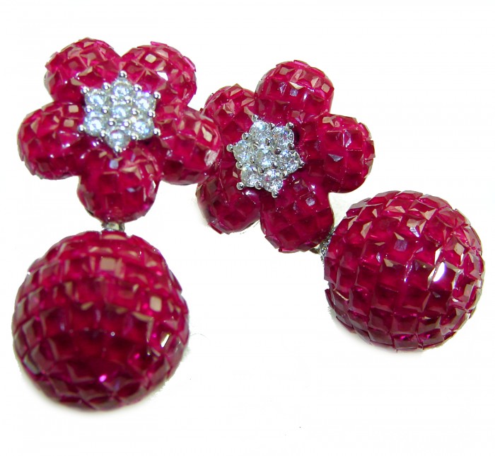 Giovanna - Authentic mystery setting 45.9 carat Ruby .925 Sterling Silver handcrafted earrings - Close-up of ruby and diamond floral earrings, mystery setting.