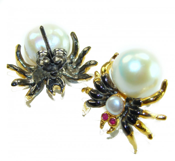 Spider Genuine Pearl 14K Gold rhodium over .925 Sterling Silver handcrafted Statement Earrings - Spider pearl earrings, gold detail, top view on white background.