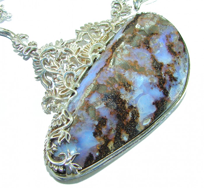 Back to nature Australian Boulder Opal .925 Sterling Silver brilliantly handcrafted necklace - Close-up of Australian Boulder Opal pendant with intricate silver detailing.