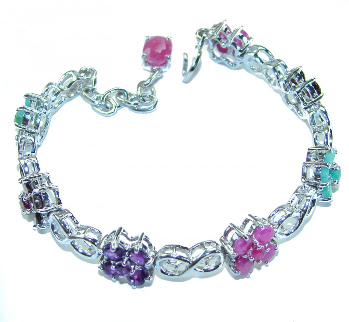 Gabriella 25.5 carat Genuine Ruby Emerald Sapphire .925 Sterling Silver handcrafted Bracelet - Bracelet with gemstones and infinity links, top view.