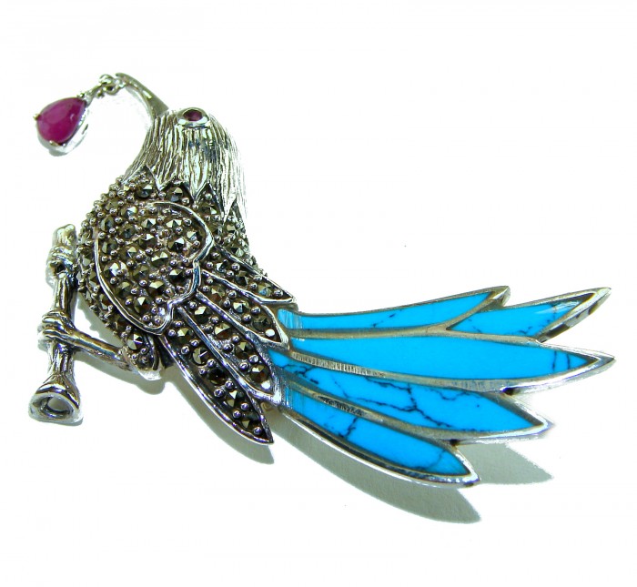 Blue Bird genuine INLAY Turquoise Marcasite .925 Sterling Silver handmade Brooch - Side view of blue bird pin with turquoise inlay and marcasite accents.