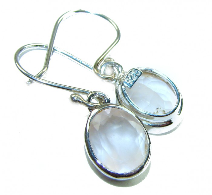 Authentic 6.2 carat Rose Quartz .925 Silver handcrafted Statement earrings - Close-up of handcrafted .925 silver earrings with rose quartz stones.