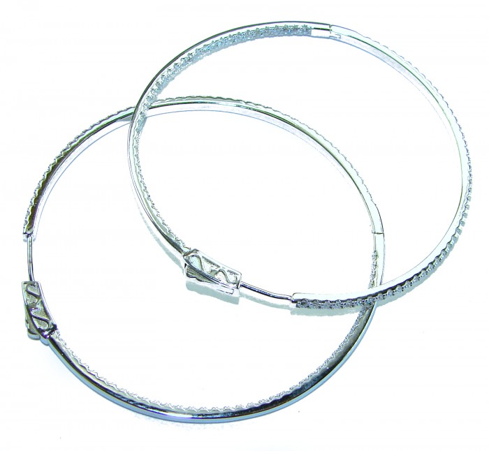 UNIQUE 2 inches long WHITE SAPPHIRE .925 Sterling Silver handmade Hoop Earrings - Two intertwined sterling silver hoops with clasp detail, top view.