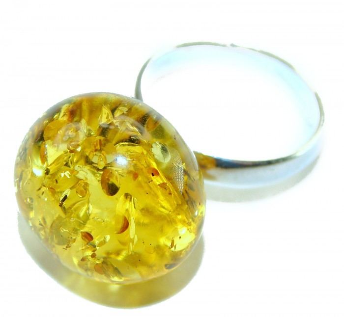 Golden Sphere Authentic Baltic Amber .925 Sterling Silver handcrafted ring; s. 8 - Close-up of golden Baltic amber sphere ring in sterling silver.