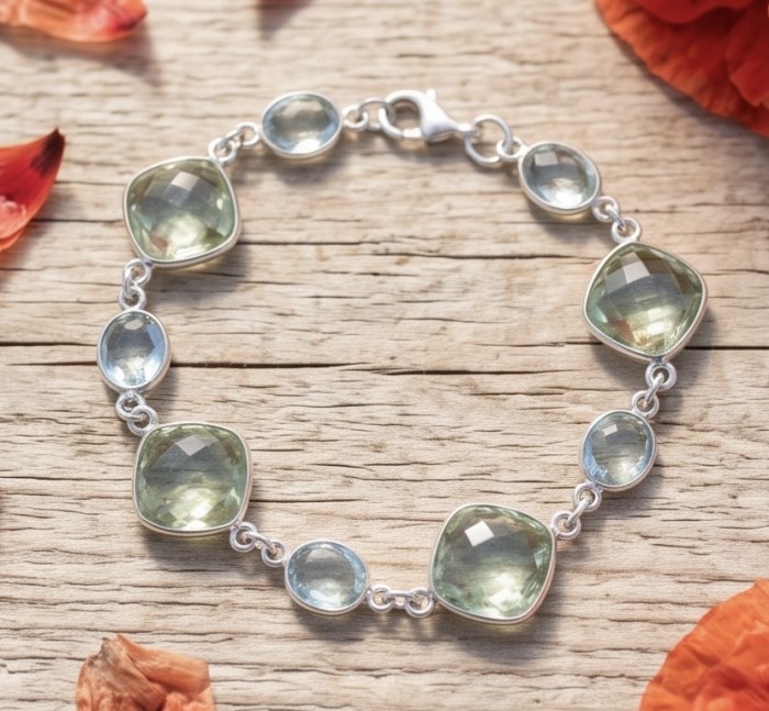 Tutti Frutti 17.5 CARAT Green Amethyst .925 Sterling Silver brilliantly handcrafted Bracelet - Green amethyst bracelet on wood background, top view.