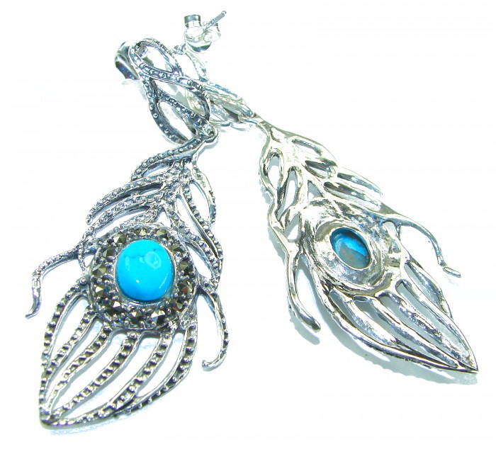 Peacock Feather design genuine Turquoise .925 Sterling Silver handcrafted Earrings - Peacock feather earrings, top view, turquoise stones, silver detailing.