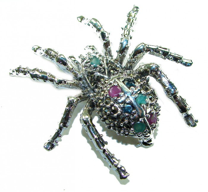 Large Black Widow Spider genuine Ruby .925 Sterling Silver handmade Pendant - Brooch - Top view of spider-shaped sterling silver brooch with rubies and gems.