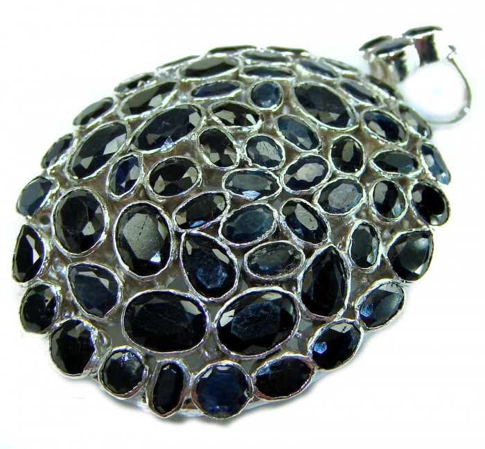 Vintage Design - 35.2 carat deep blue Sapphire .925 Sterling Silver handcrafted PENDANT and Brooch - Close-up of vintage sapphire pendant with sterling silver setting.