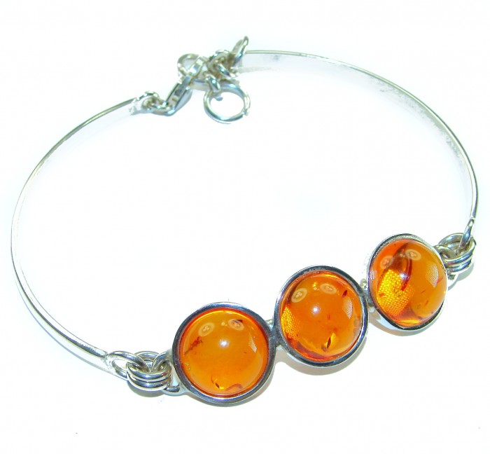 Excellent Baltic Amber .925 Sterling Silver entirely handcrafted Bracelet - Close-up of Baltic amber bracelet with sterling silver setting.