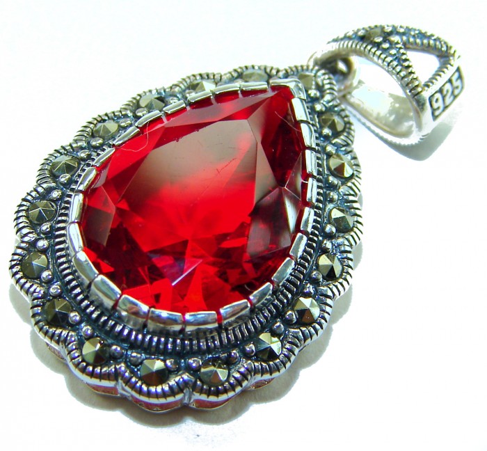 Crimson Fire Authentic 12.4 carat Garnet .925 Sterling Silver brilliantly handcrafted pendant - Close-up of Crimson Fire garnet pendant with .925 sterling silver.