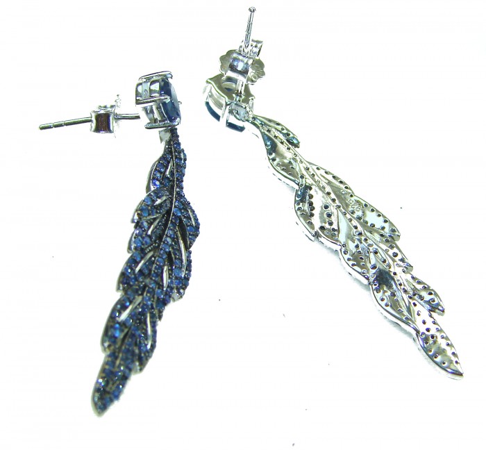 Giovanna - Authentic oval cut 9.9 carat Sapphire .925 Sterling Silver handcrafted earrings - Earrings side view, sapphire detailing on each piece, sterling silver.
