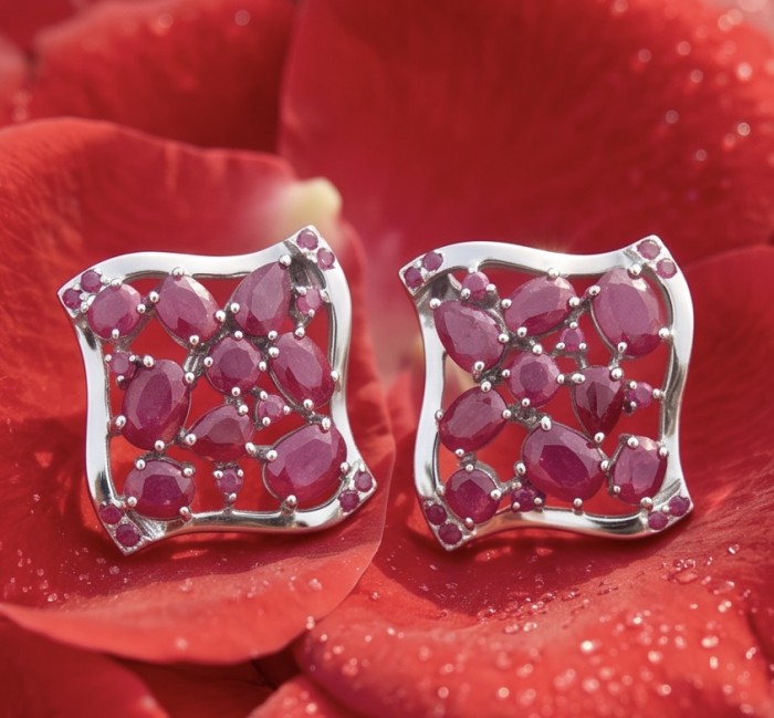 Giovanna -15.2 carat Kashmir Ruby .925 Sterling Silver dipped in rhodium handcrafted incredible Statement earrings - Close-up of Giovanna Kashmir Ruby earrings on red petals