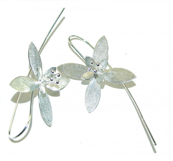 Silver Flowers Italy made .925 Sterling Silver Earrings - Top view of Italy-made .925 sterling silver flower earrings