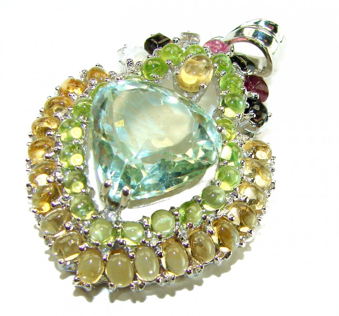 Green Ivy 25.5 carat Green Amethyst - Prasolite .925 Sterling Silver handcrafted pendant - Heart-shaped amethyst pendant close-up with colorful gemstone accents.