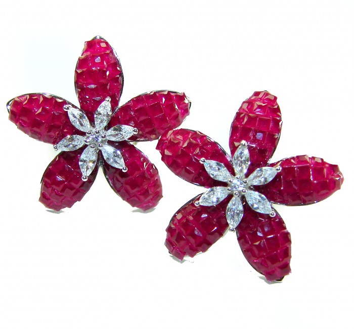 Magnificent Jewel 21.5 carat Ruby .925 Sterling Silver handcrafted incredible earrings - Ruby flower earrings, top view, with diamond accents, sterling silver.