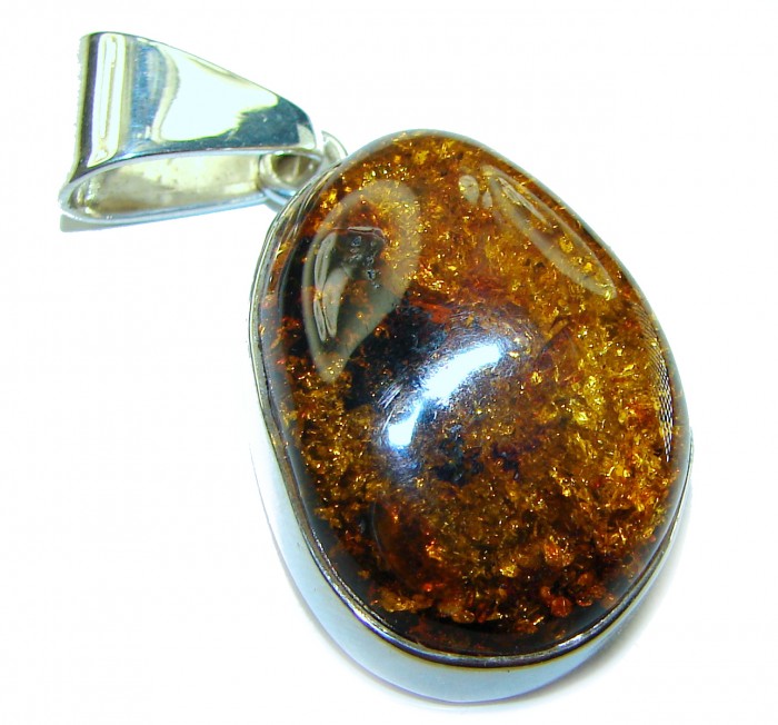 Golden natural Baltic Amber .925 Sterling Silver handmade Pendant - Close-up of golden Baltic amber pendant in sterling silver setting.