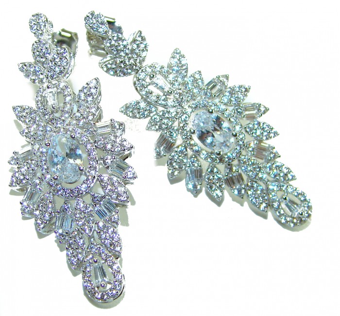 LUXURIUS 12.2 carat White Topaz .925 Sterling Silver handcrafted earrings - Elegant earrings, top view, showcasing intricate white topaz design.