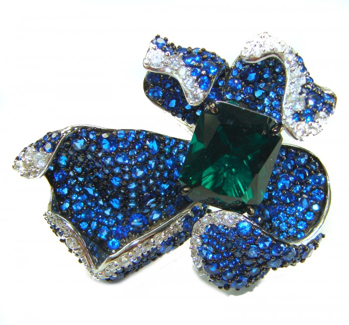 Wild Flower 55.2 carat authentic Colombian Emerald Sapphire.925 Sterling Silver handcrafted Statement Ring size 6 1/4 - Close-up of Wild Flower jewelry with emerald and sapphire details.