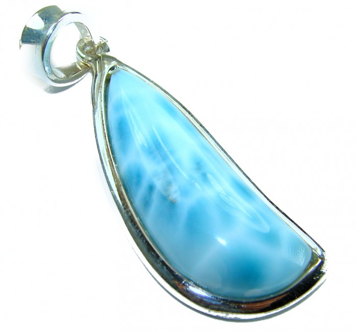 The best quality Natural Larimar from Dominican Republic .925 Sterling Silver handcrafted pendant - Larimar pendant, close-up side view, in silver setting.