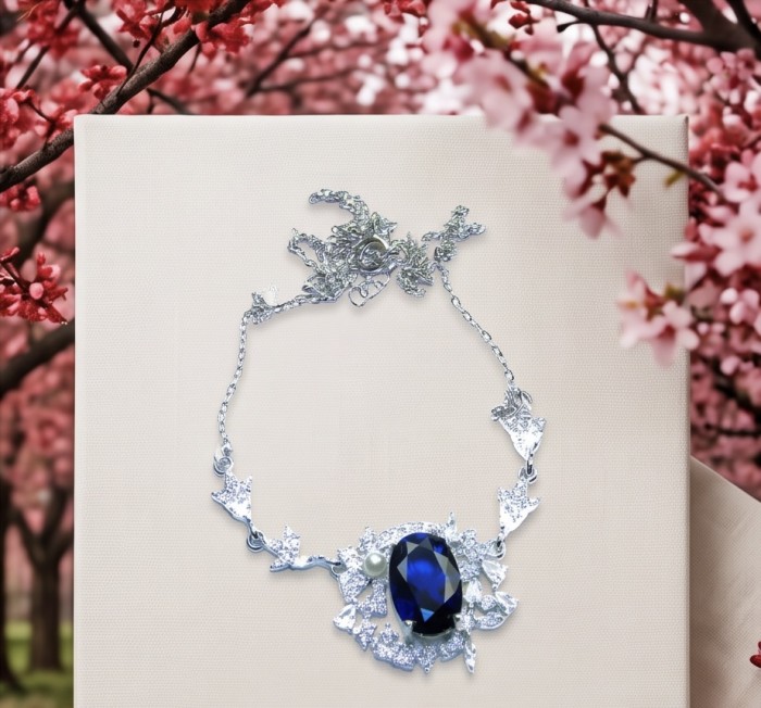 Vintage style - Giovanna - oval pear cut 6.8 carat Sapphire .925 Sterling Silver handcrafted Statement Necklace - Vintage style necklace with sapphire and floral design, front view.