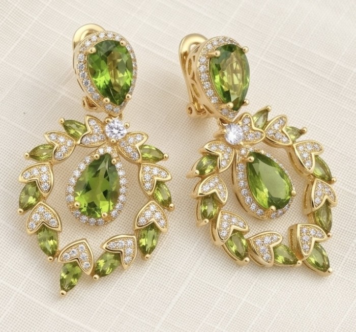 Serenade authentic 12.5 carat Brazilian Green Topaz 18K Gold over .925 Sterling Silver handcrafted Earrings - Green topaz earrings with 18K gold, stone close-up on fabric background