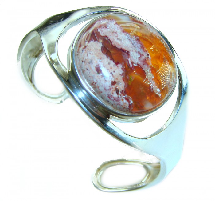 Simplicity 85.5 carat Genuine Mexican Fire Opal handcrafted .925 Sterling Silver Bracelet / Cuff - Side view of silver bracelet with Mexican Fire Opal stone
