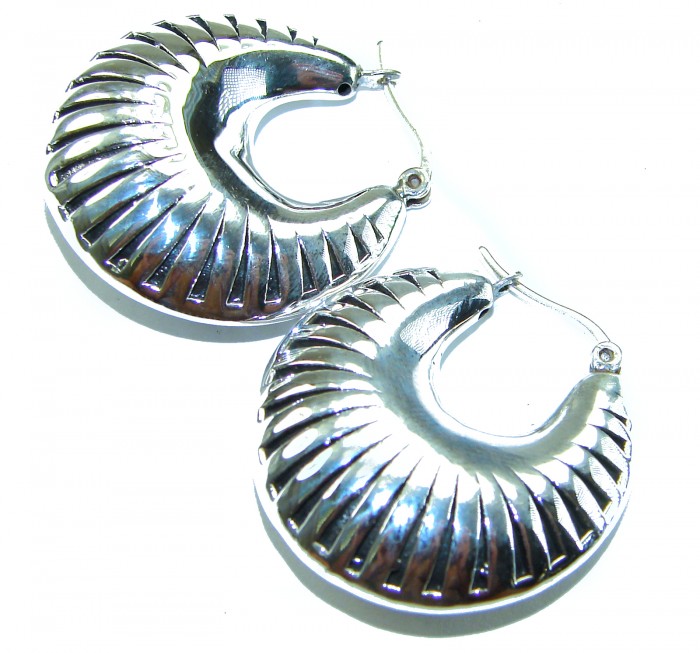 Highly Polished Fancy Modern design .925 Sterling Silver Italy made Earrings - Polished .925 sterling silver earrings, top view of modern design.