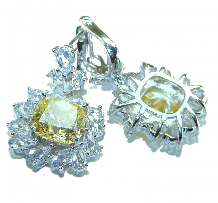 15.5 carat Golden - yellow Montana Sapphire .925 Sterling Silver handcrafted earrings - Close-up of golden-yellow Montana sapphire earrings in sterling silver