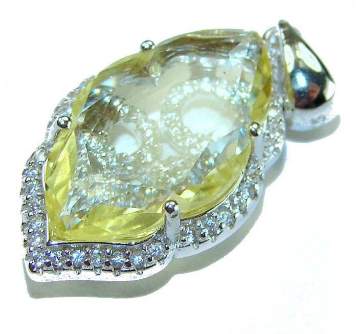 Divine Beauty 10.5 carat Lemon Quartz .925 Sterling Silver Handcrafted .925 Sterling Silver handcrafted pendant - Close-up of lemon quartz pendant with .925 sterling silver setting.