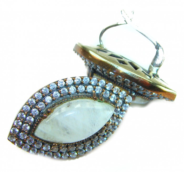 Cascades OF LIGHT Genuine 15.2 carat Fire Moonstone .925 Silver handcrafted earrings - Close-up of Cascades OF LIGHT moonstone earrings with gemstone detailing.