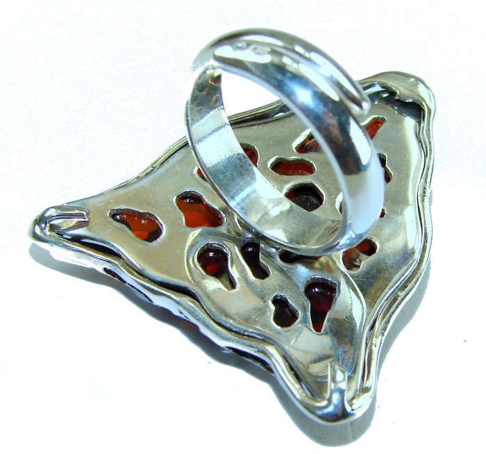 Precious Cheetah Baltic Amber .925 Sterling Silver handmade Large ring size 8 adjustable - Ring close-up with red amber and silver cheetah pattern design.