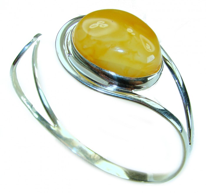 Vintage Design 21.8 grams Genuine Butterscotch Polish Amber .925 Sterling Silver handmade Bracelet / Cuff - Side view of vintage bracelet with butterscotch amber stone.