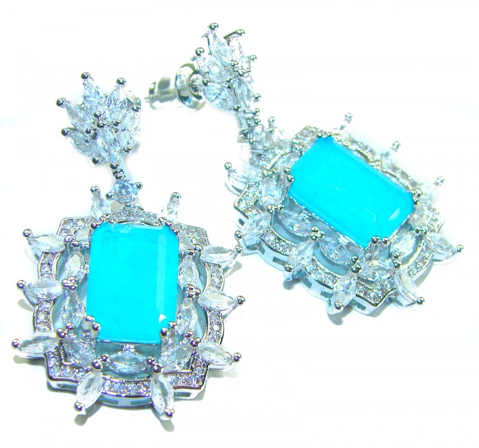 Royalty baquete cut 12.2 carat Paraiba Tourmaline .925 Sterling Silver entirely handmade earrings - Close-up of drop earrings with Paraiba Tourmaline and clear stones.