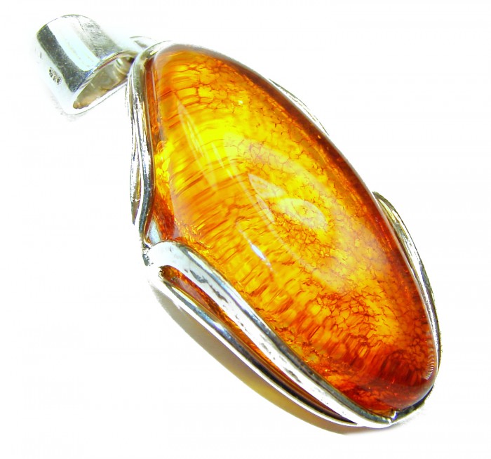 Prehistoric Authentic Baltic Amber .925 Sterling Silver beautifully handcrafted Pendant - Stone close-up of Baltic amber in sterling silver setting