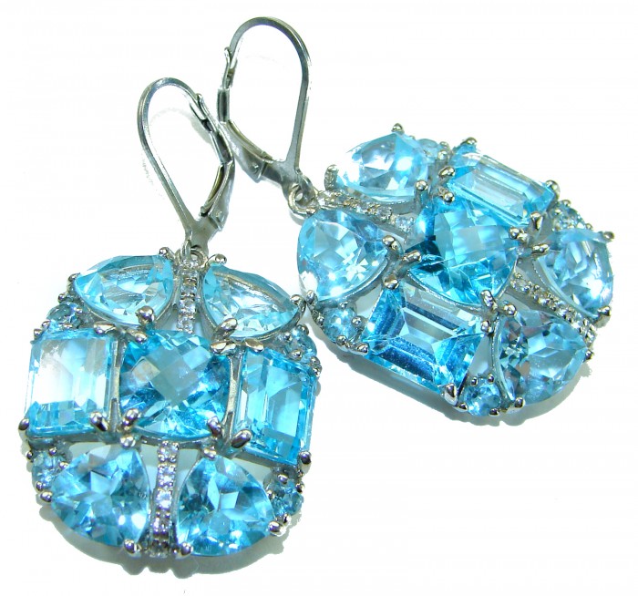 Atlantica 33.7 carat Swiss Blue Topaz .925 Sterling Silver Handcrafted Statement earrings - Swiss Blue Topaz earrings in Sterling Silver, top view close-up.