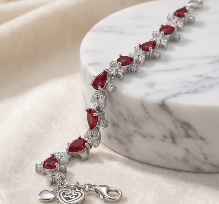 Crimson Fire 5.2 carat Ruby .925 Sterling Silver .925 Sterling Silver Statement Bracelet - Clasp and stone detail of Crimson Fire ruby bracelet on marble surface.