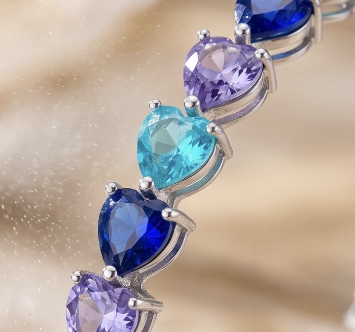 14.8 carat yellow Sapphire Apatite Amethyst 9.2 carat Sapphire black rhodium over over .925 Sterling Silver handmade bangle Bracelet - Close-up of multicolored heart-shaped gemstone bracelet.