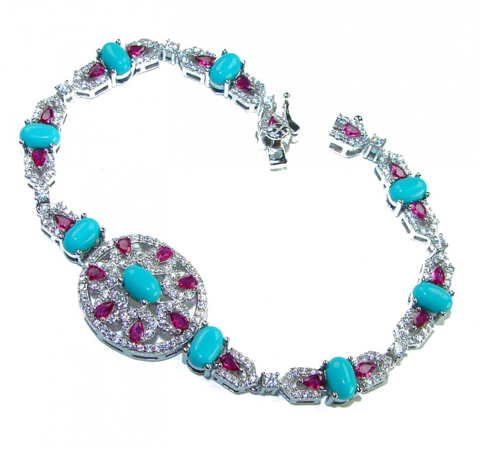 Serenity- 21.5 carat genuine Swiss Blue Turquoise 9.5 carat Ruby .925 Sterling Silver handmade Statement Bracelet - Turquoise and red gemstone bracelet, top view.