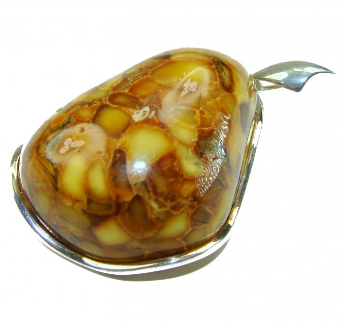 Large Prehistoric Authentic Baltic Amber .925 Sterling Silver beautifully handcrafted Pendant - Close-up of large prehistoric Baltic amber in sterling silver setting.