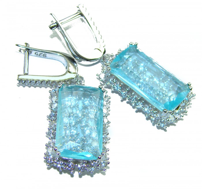 Aqua - Splendid 10.5 carat Swiss Blue Topaz .925 Sterling Silver Handcrafted Earrings - Close-up of Swiss Blue Topaz earrings with sterling silver clasps.