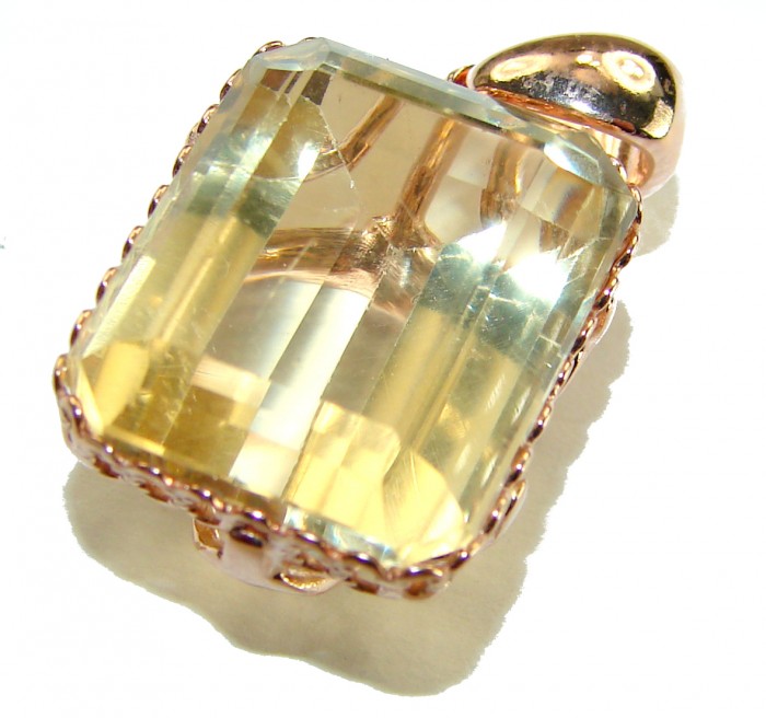 Baquette cut 10.3 carat Lemon Quartz 18K Gold over .925 Sterling Silver handcrafted pendant - Close-up of baguette cut lemon quartz pendant in gold setting.