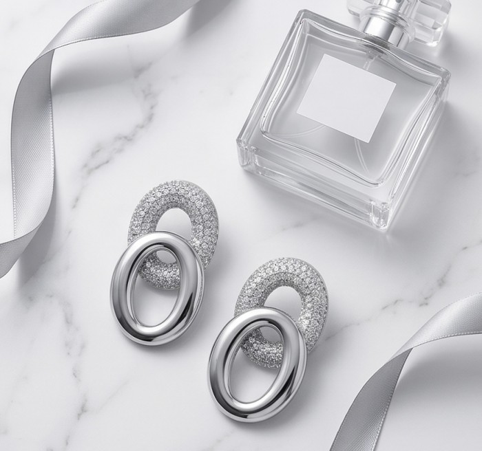 TIFFANY - LUXURIUS - Natural pave White Topaz rhodium over .925 Sterling Silver handmade earrings - Elegant earrings and perfume bottle with silver ribbon on marble surface